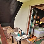 Quarto em Acomodações Particulares Tourist House Capricorn